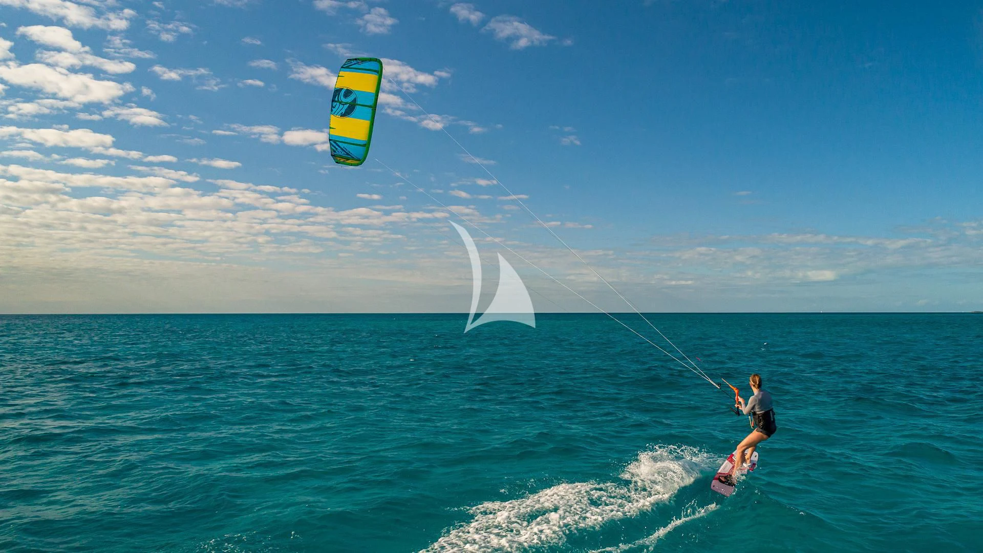 a person kite surfing on the sea aboard SEA CLASS Yacht for Sale