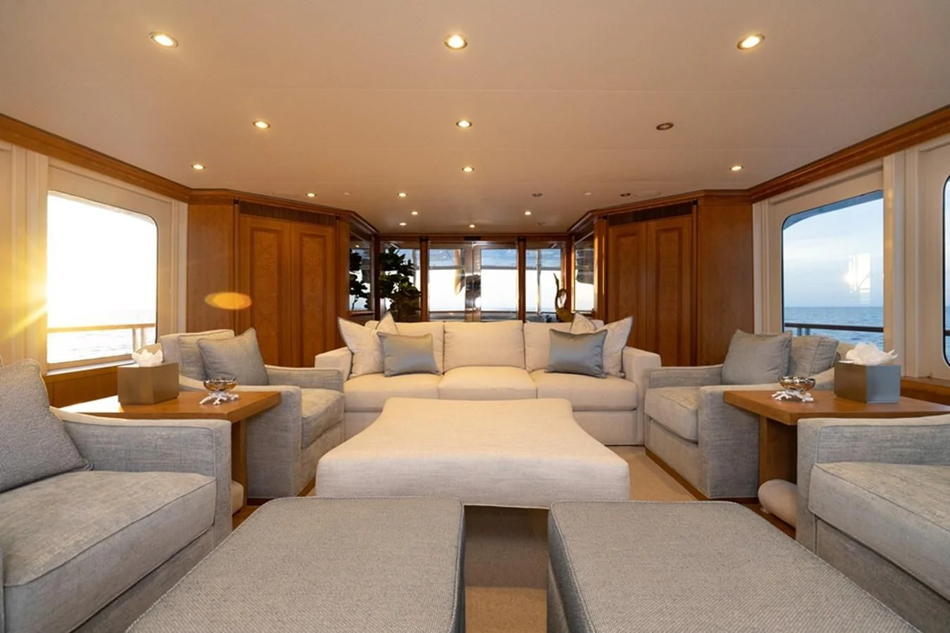 a living room with a large window aboard SEA CLASS Yacht for Sale