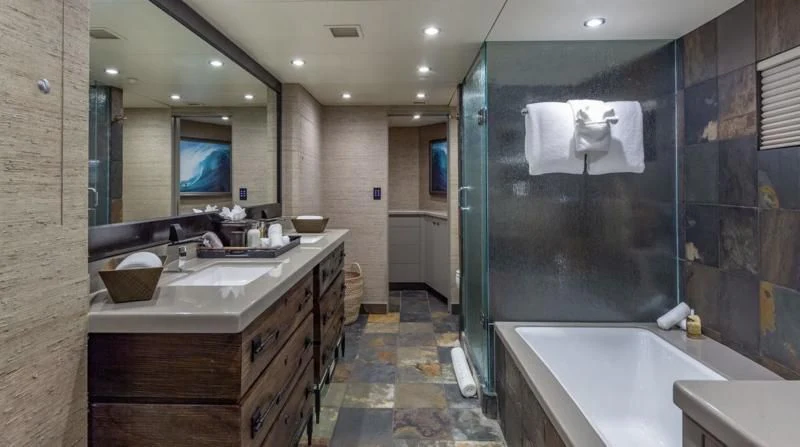 a bathroom with a large mirror aboard SEA CLASS Yacht for Sale