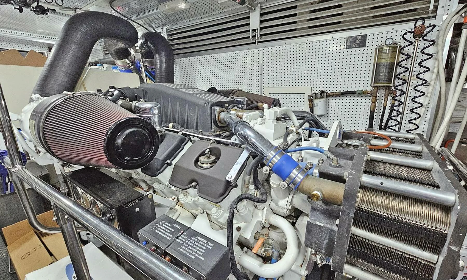 a car engine with a large engine aboard MY KIMBERLY Yacht for Sale