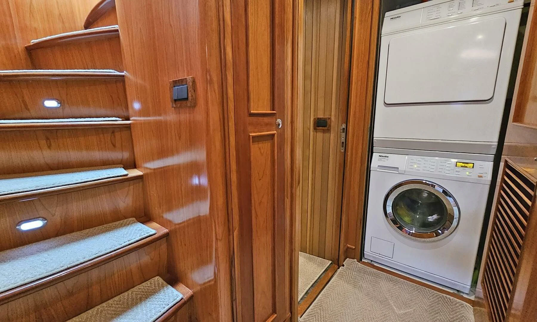 a closet with a washing machine aboard MY KIMBERLY Yacht for Sale