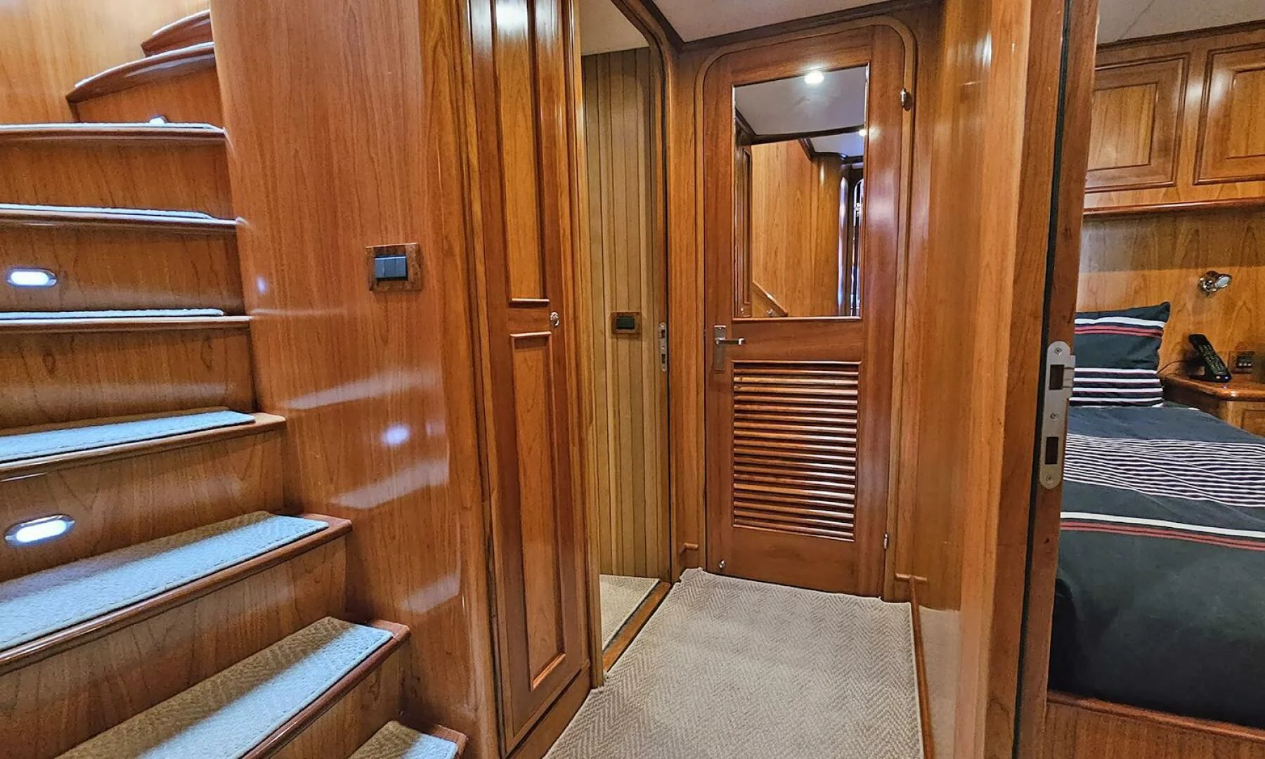 a room with wooden cabinets aboard MY KIMBERLY Yacht for Sale