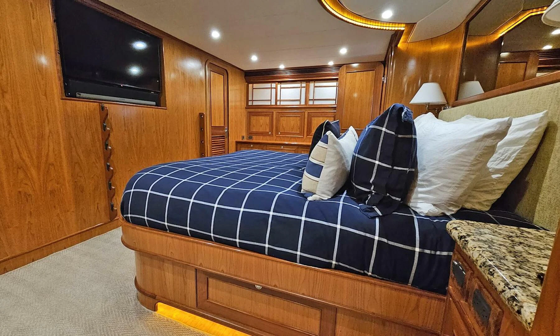 a bed in a room aboard MY KIMBERLY Yacht for Sale