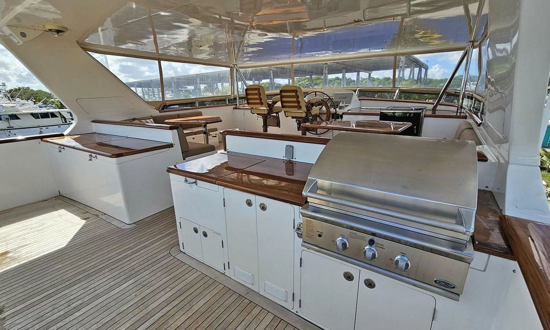 a room with a table and chairs aboard MY KIMBERLY Yacht for Sale