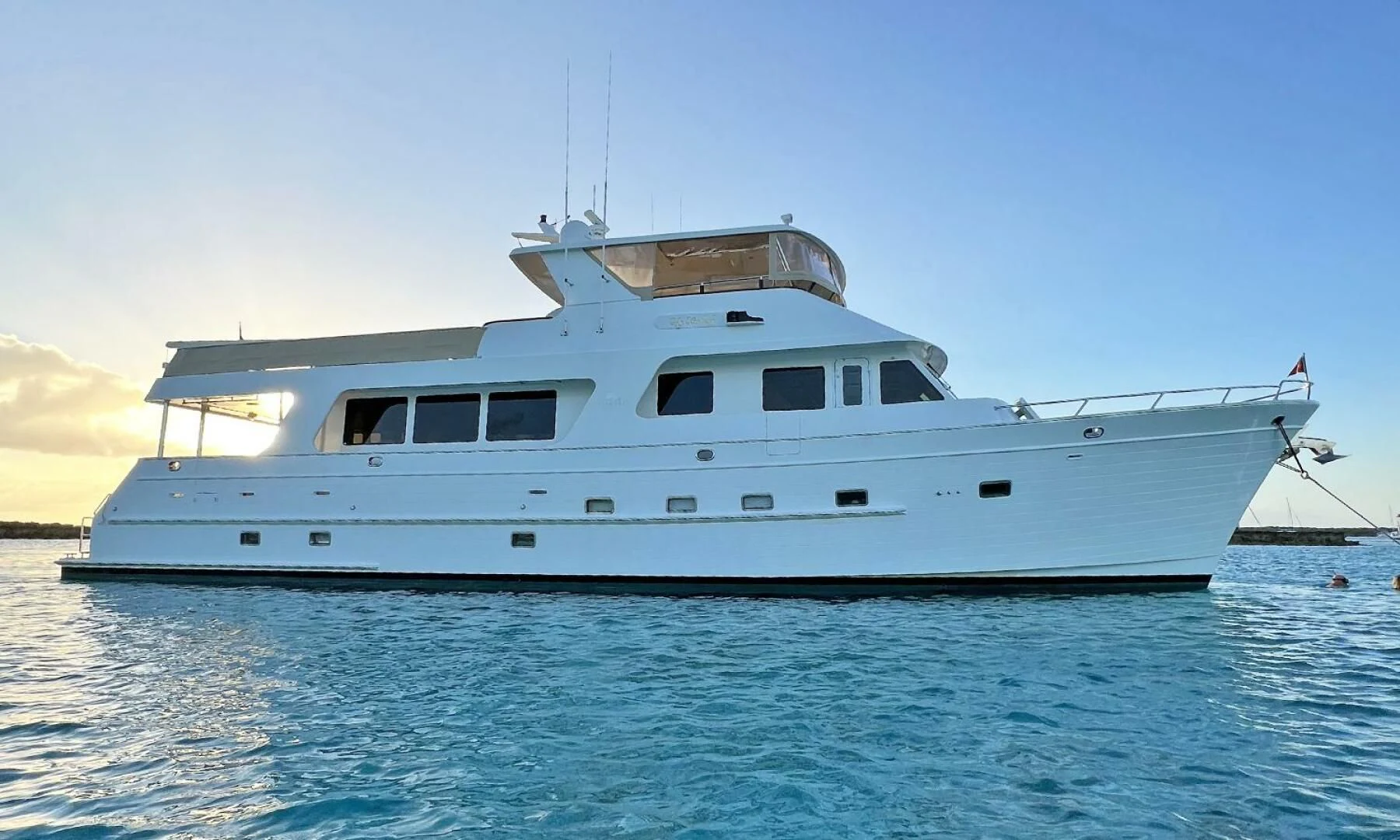 a white boat on the water aboard MY KIMBERLY Yacht for Sale