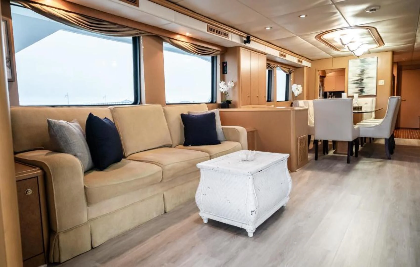 a living room with a couch and a table aboard BUSINESS TRIP 2 Yacht for Sale