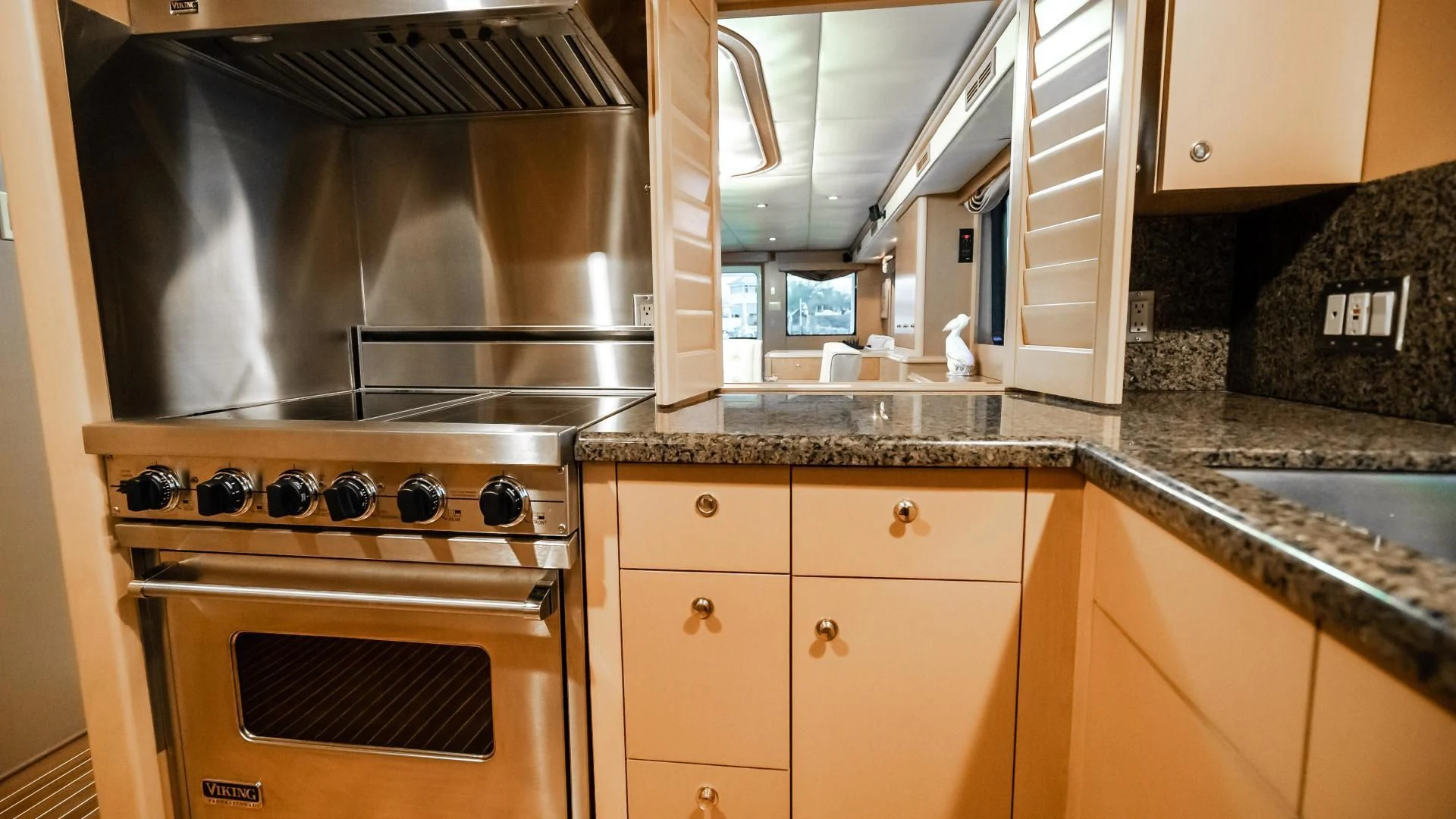 a kitchen with a stove and oven aboard BUSINESS TRIP 2 Yacht for Sale