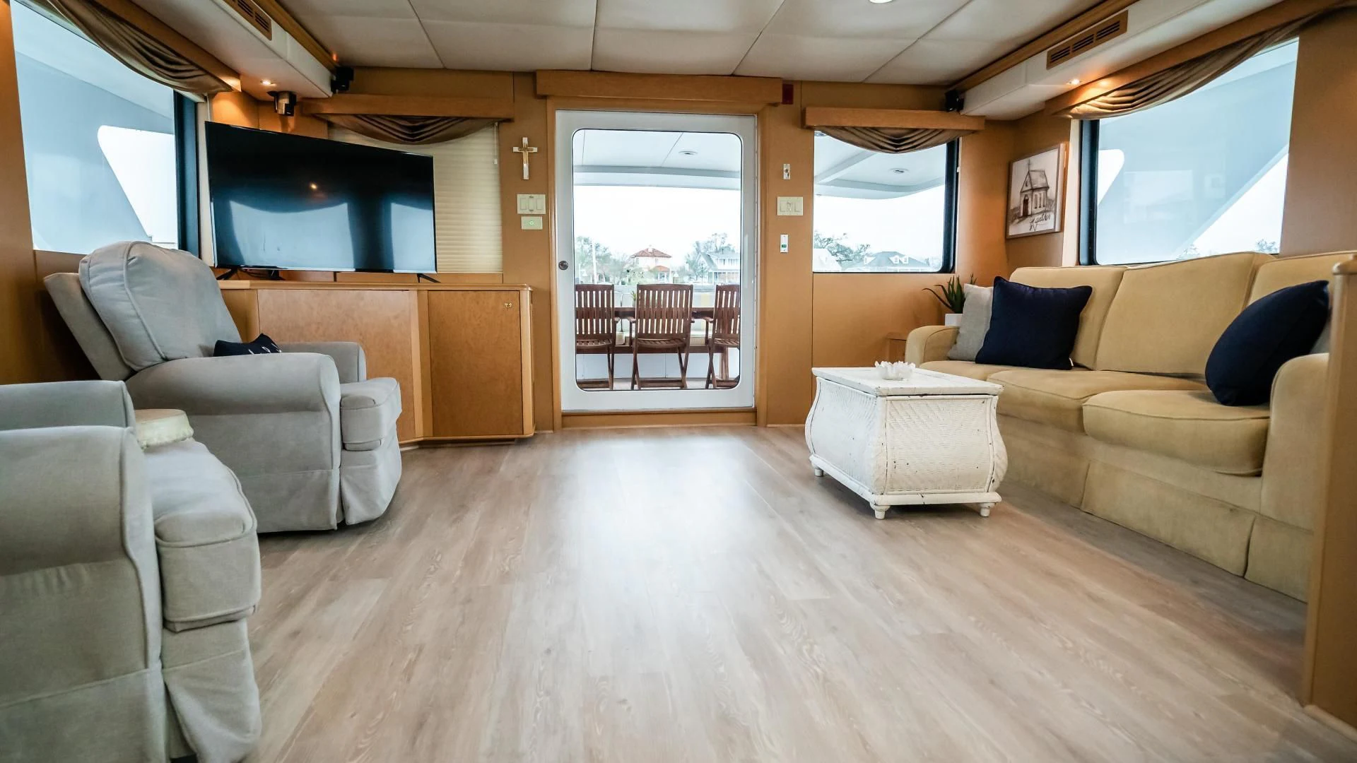 a living room with a couch and a table aboard BUSINESS TRIP 2 Yacht for Sale