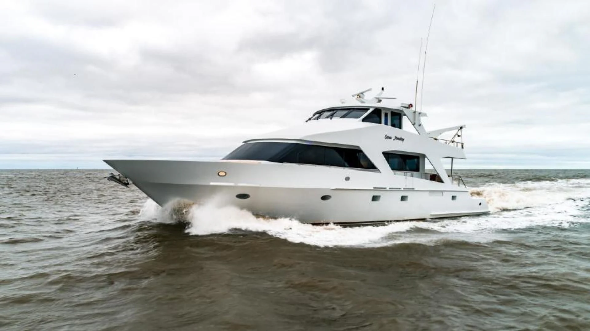 a white boat in the water aboard BUSINESS TRIP 2 Yacht for Sale