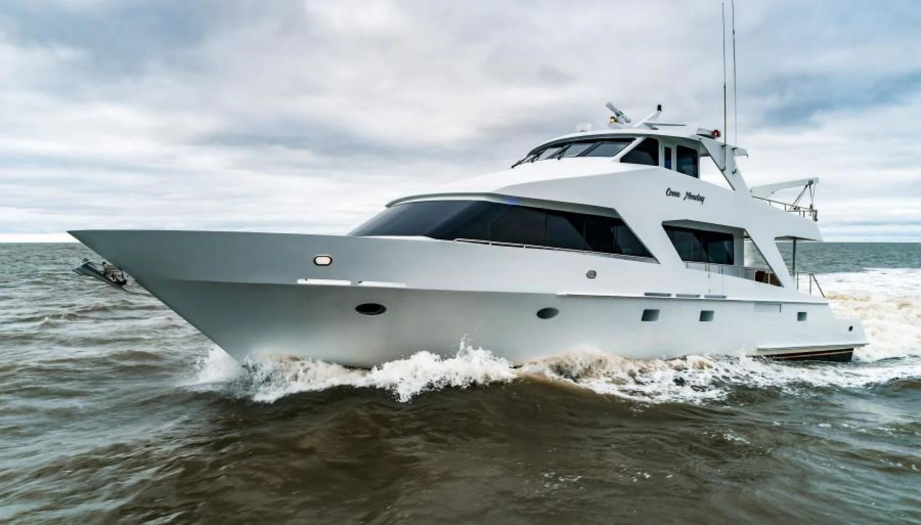 a white boat in the water aboard BUSINESS TRIP 2 Yacht for Sale