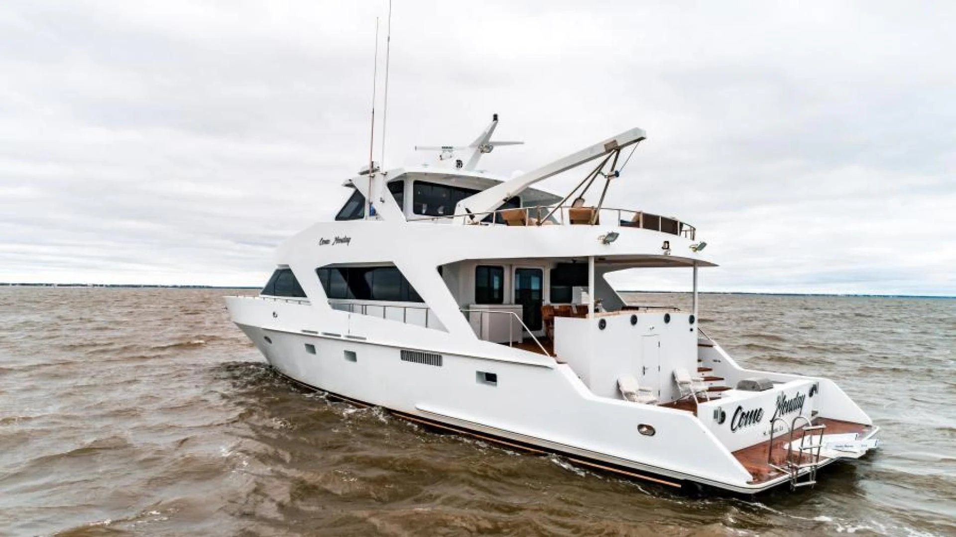 a boat on the beach aboard BUSINESS TRIP 2 Yacht for Sale