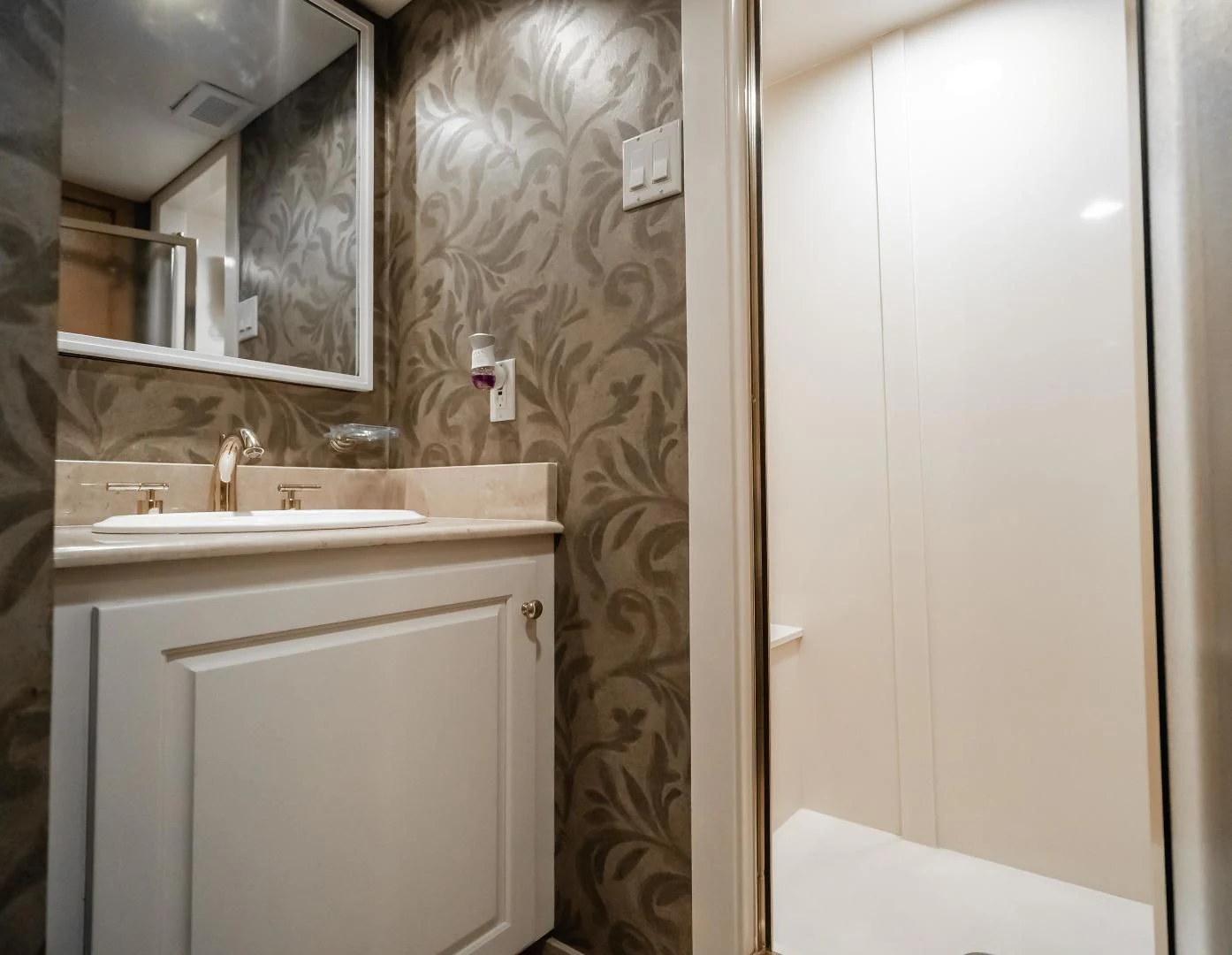 a bathroom with a sink and a mirror aboard BUSINESS TRIP 2 Yacht for Sale