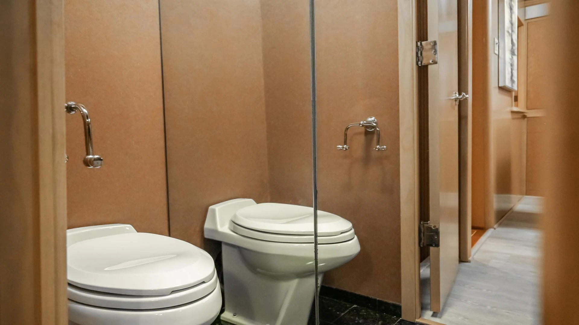 a bathroom with a toilet aboard BUSINESS TRIP 2 Yacht for Sale
