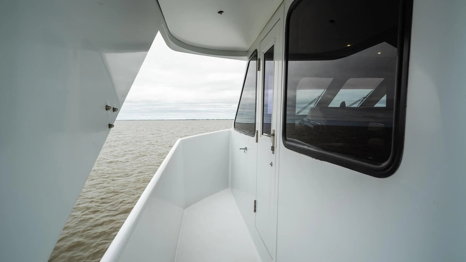 a white vehicle with a window aboard BUSINESS TRIP 2 Yacht for Sale