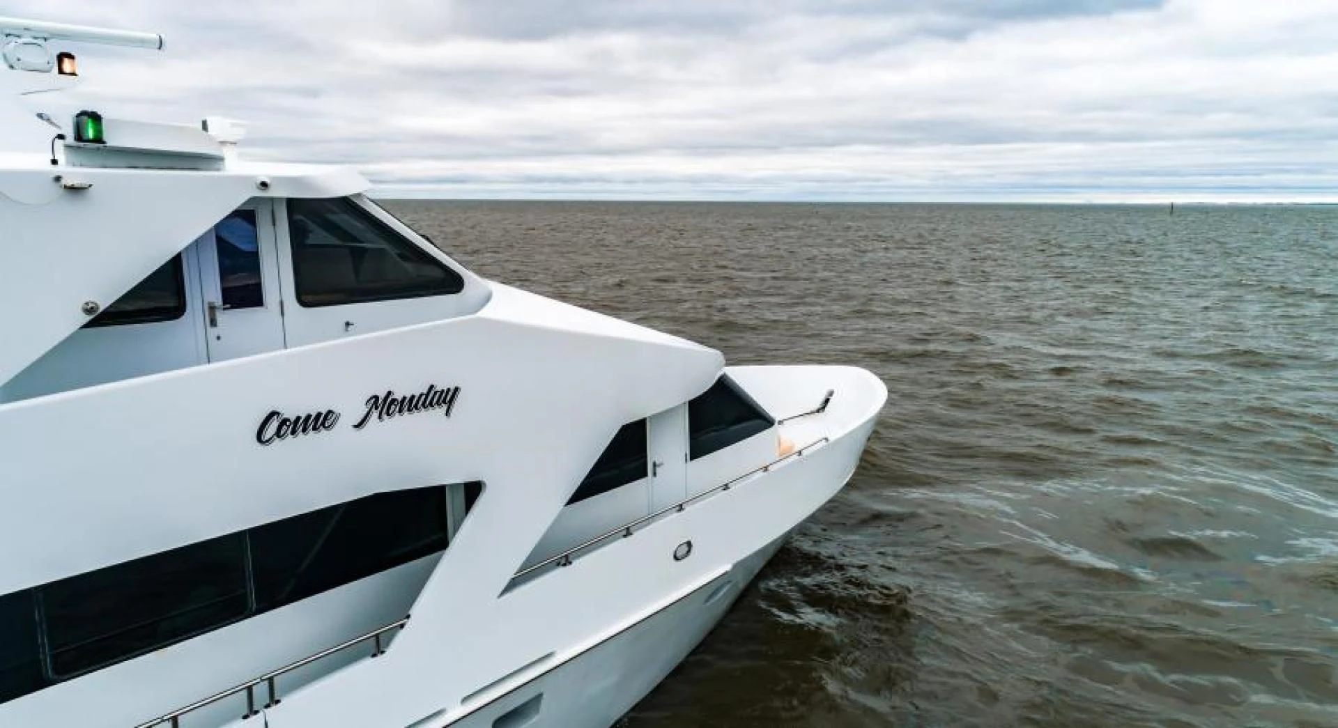 a white yacht in the water aboard BUSINESS TRIP 2 Yacht for Sale