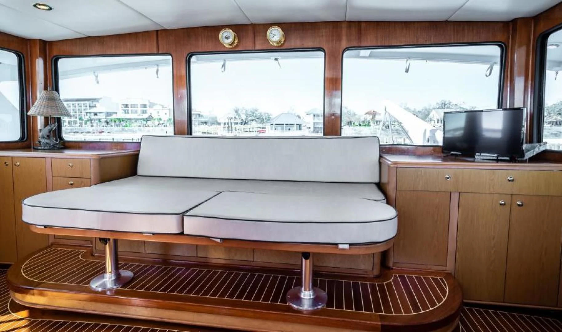 a white couch in a room aboard BUSINESS TRIP 2 Yacht for Sale