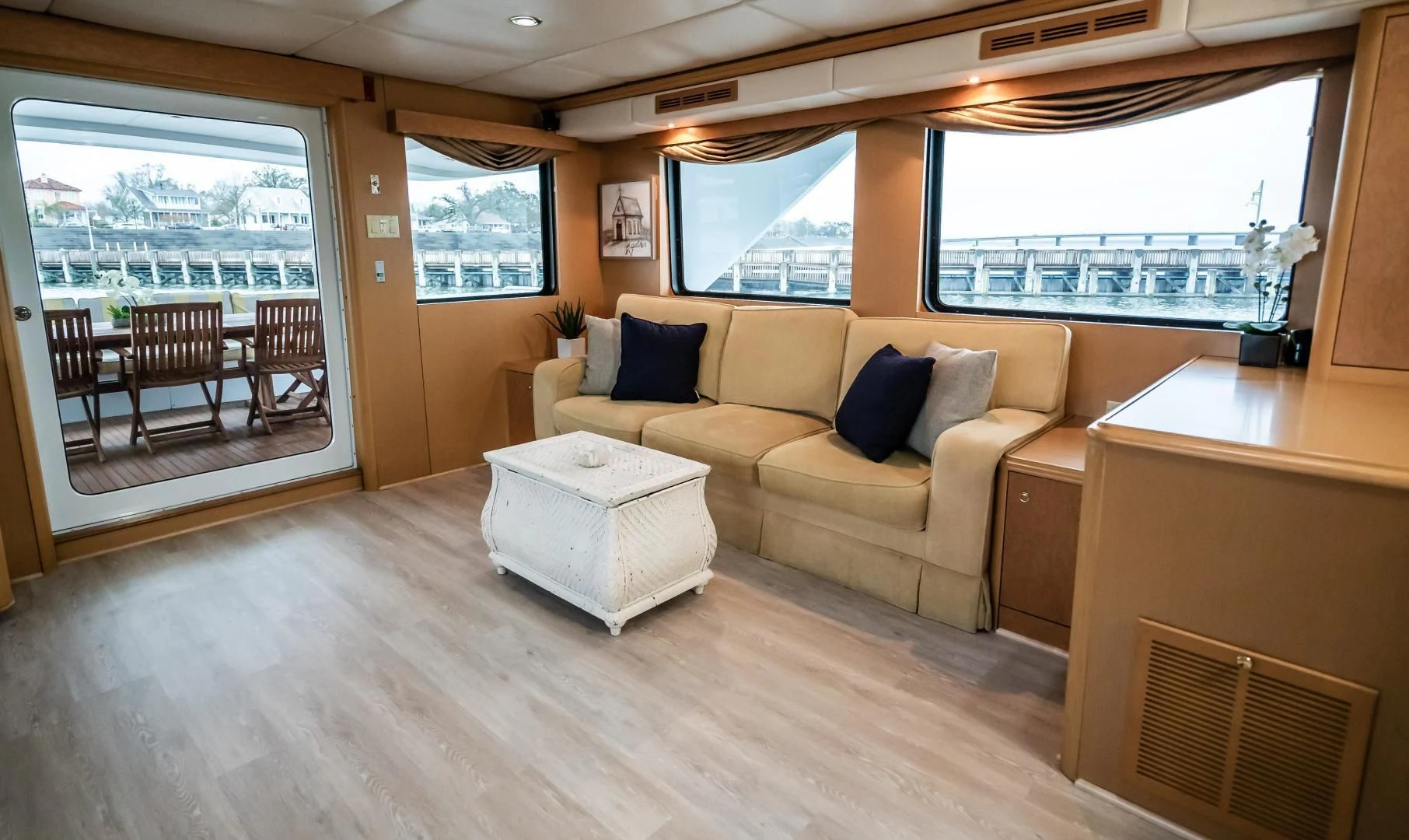 a living room with a couch and a table aboard BUSINESS TRIP 2 Yacht for Sale