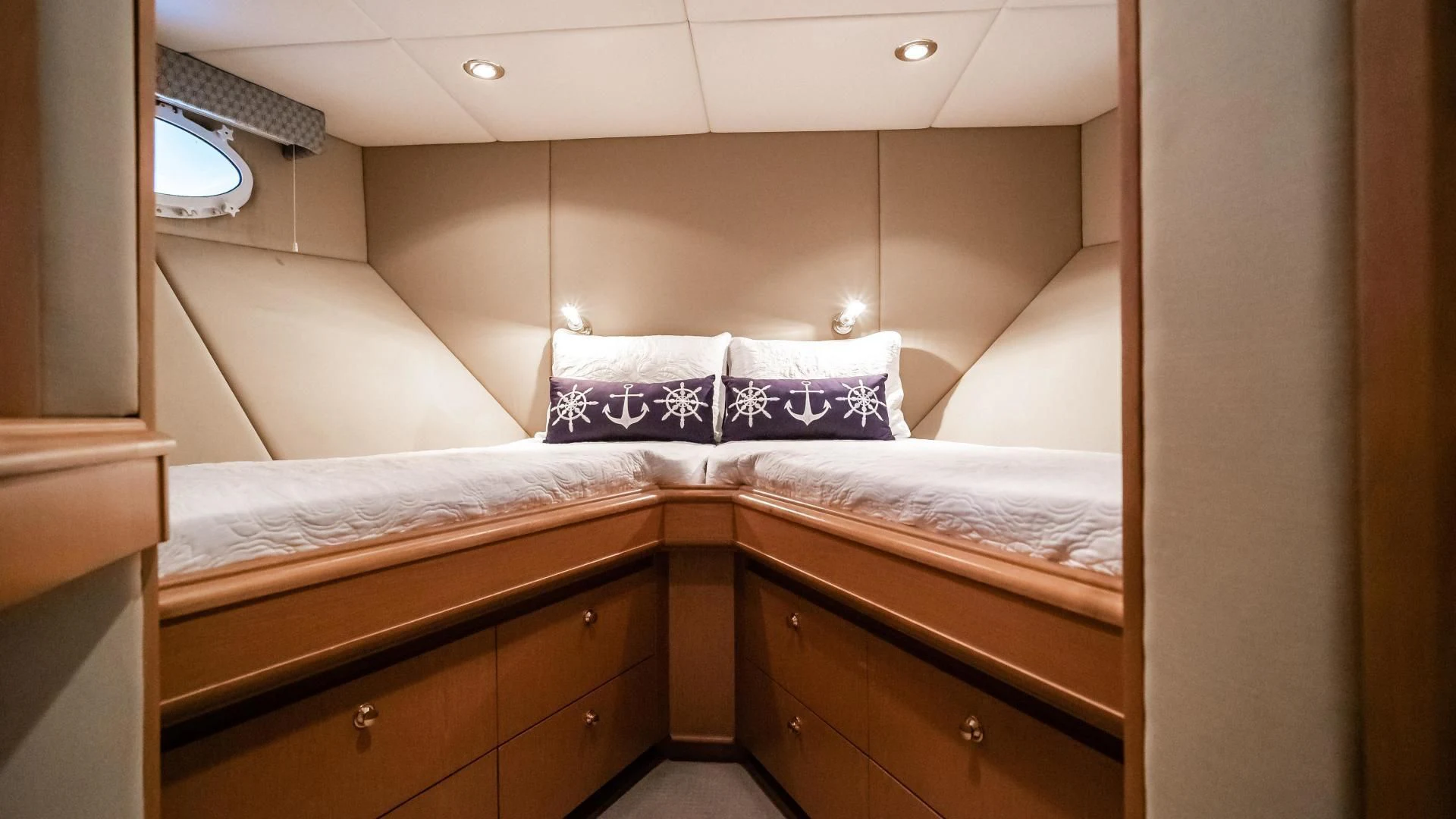 a bed with white sheets aboard BUSINESS TRIP 2 Yacht for Sale