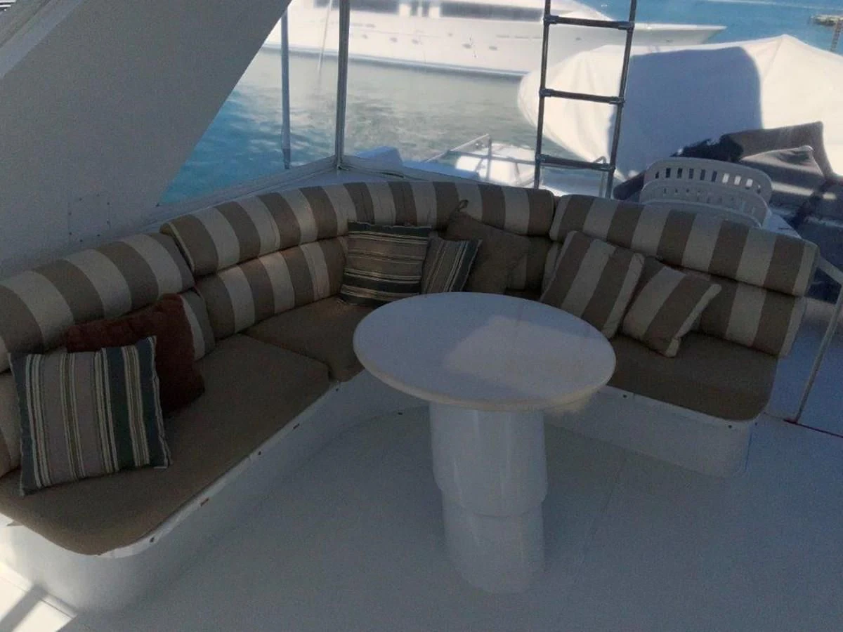 a white table on a boat aboard LADY GRACE Yacht for Sale