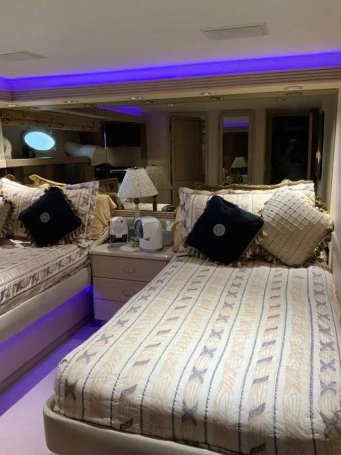 a couple of beds in a hotel room aboard LADY GRACE Yacht for Sale