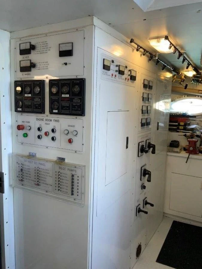 a white electrical cabinet aboard LADY GRACE Yacht for Sale