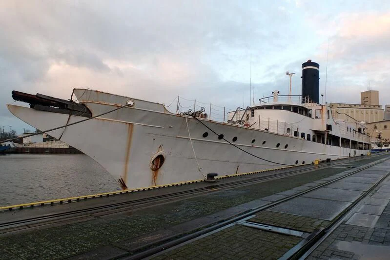 a large ship docked aboard ARGOSSY Yacht for Sale