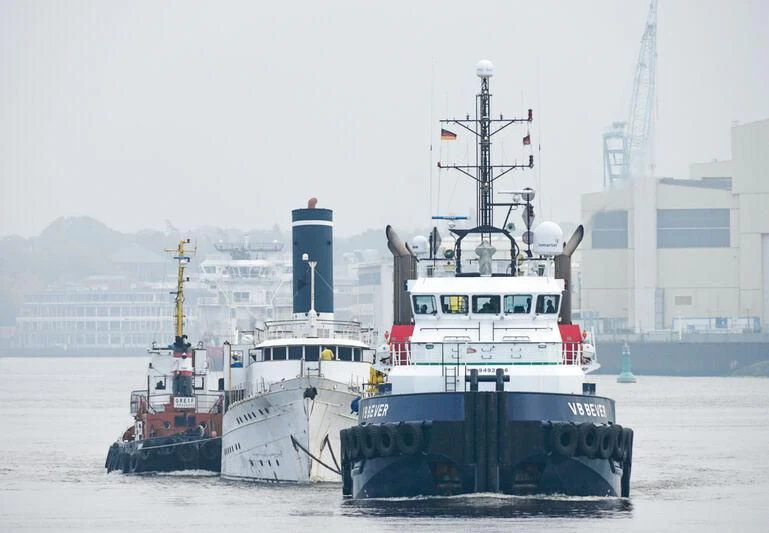 a couple of boats in the water aboard ARGOSSY Yacht for Sale
