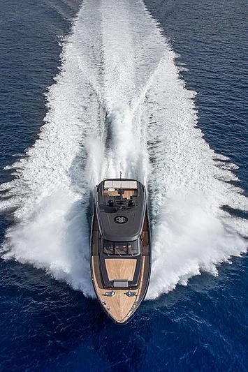 a car driving on water aboard FREEDOM Yacht for Sale