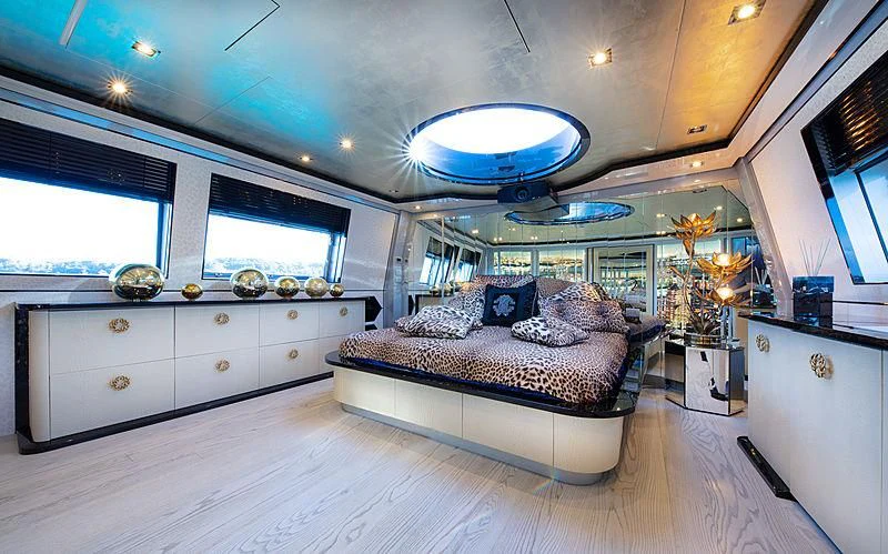 a bedroom with a large bed aboard FREEDOM Yacht for Sale