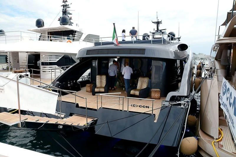 a boat with people standing on the deck aboard FREEDOM Yacht for Sale