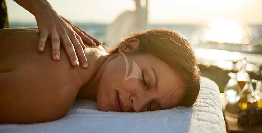 a person lying on a bed aboard M/Y ANTHEA Yacht for Sale