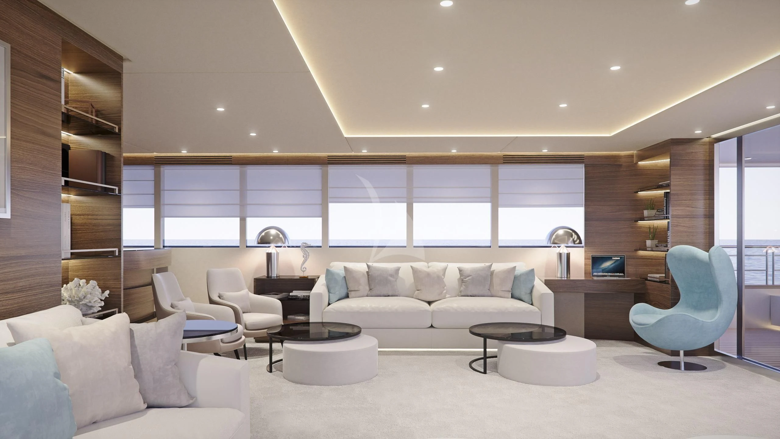 a living room with a white couch and a large window aboard M/Y ANTHEA Yacht for Sale