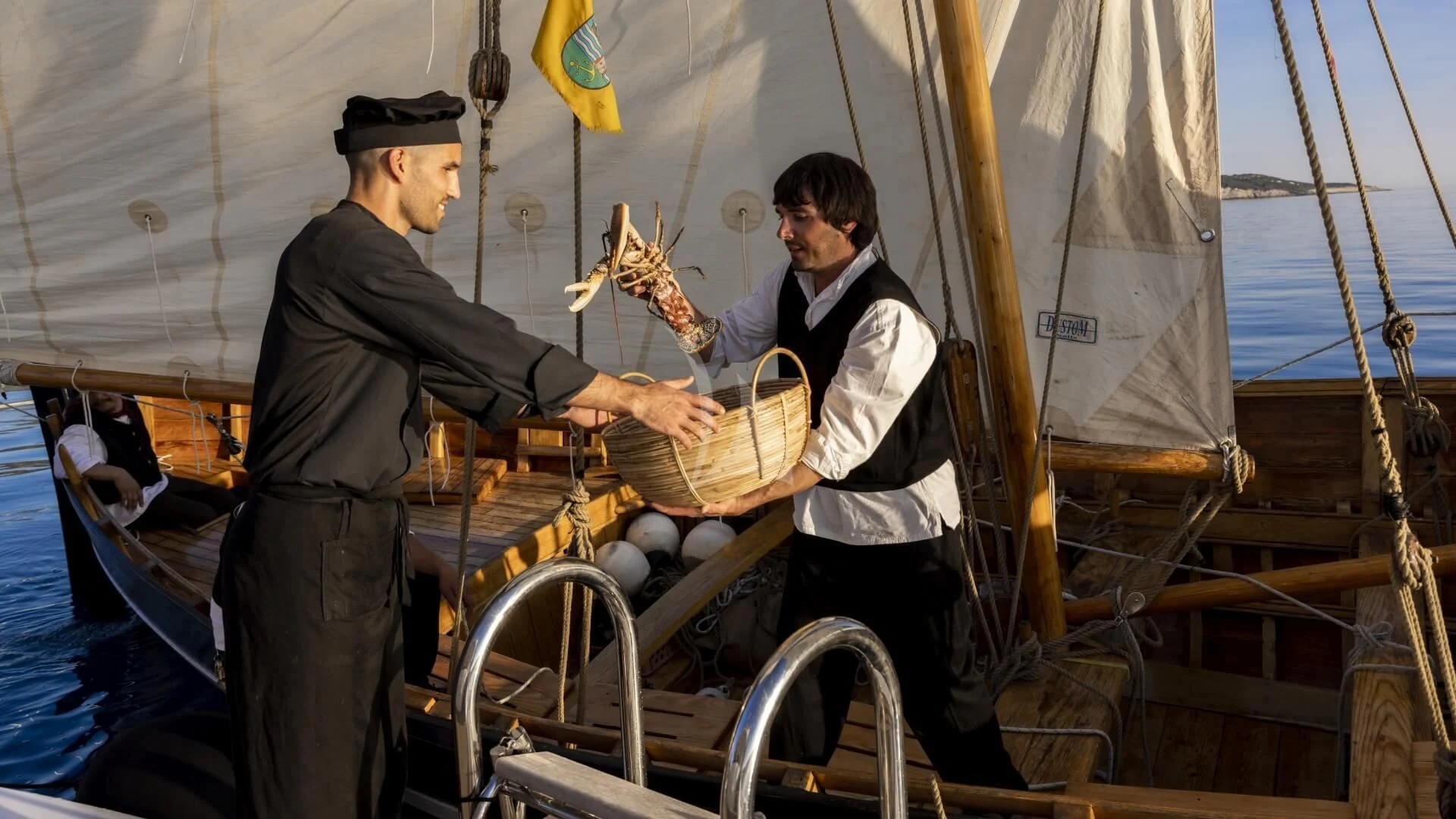 a man and a woman in a boat with a large fish aboard M/Y ANTHEA Yacht for Sale