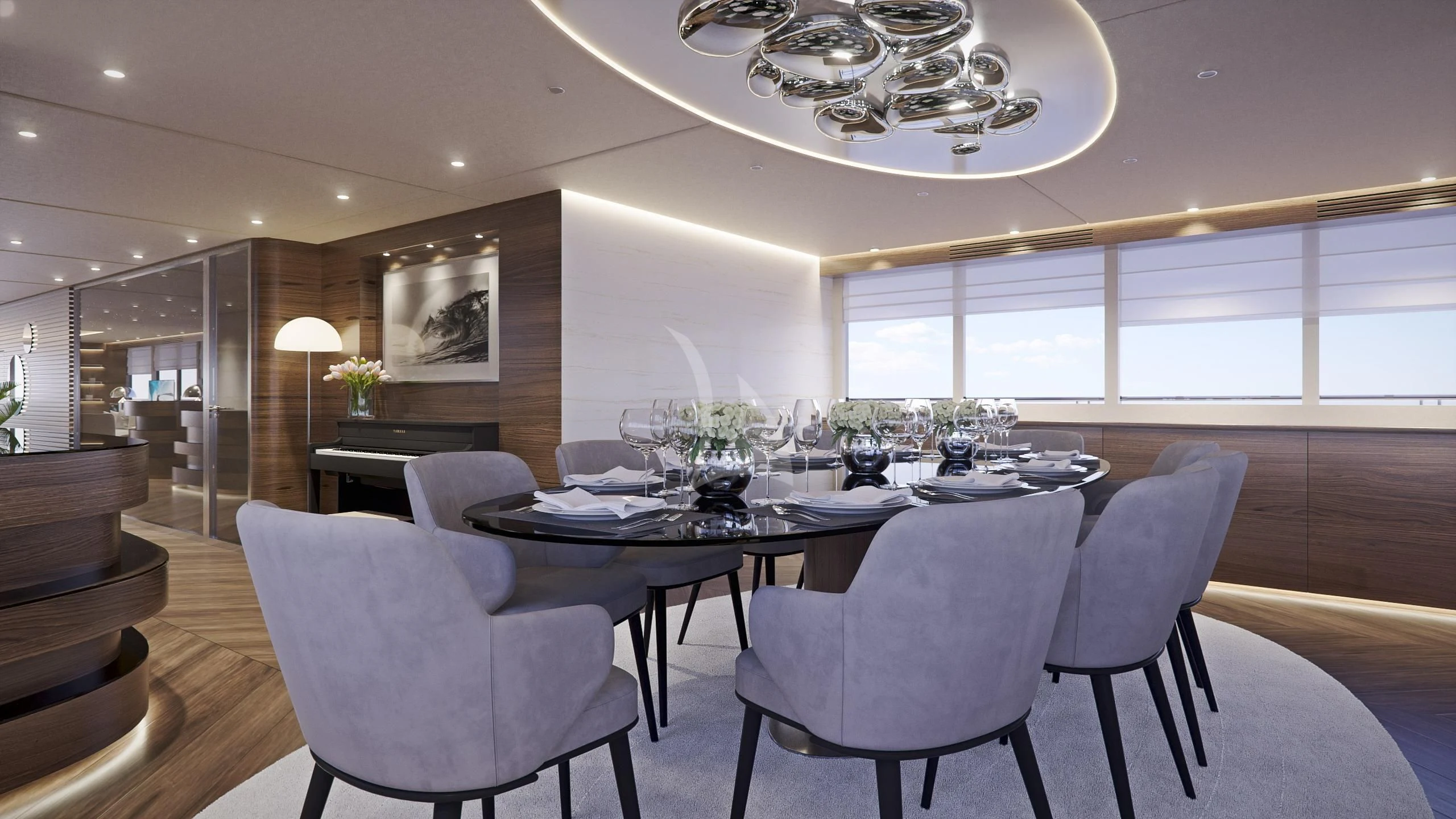 a large dining room with a large table and chairs aboard M/Y ANTHEA Yacht for Sale