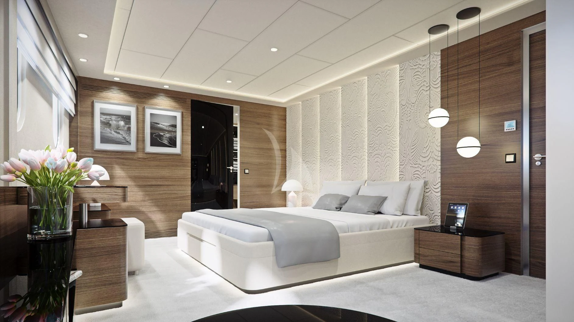 a room with a bed and a desk aboard M/Y ANTHEA Yacht for Sale