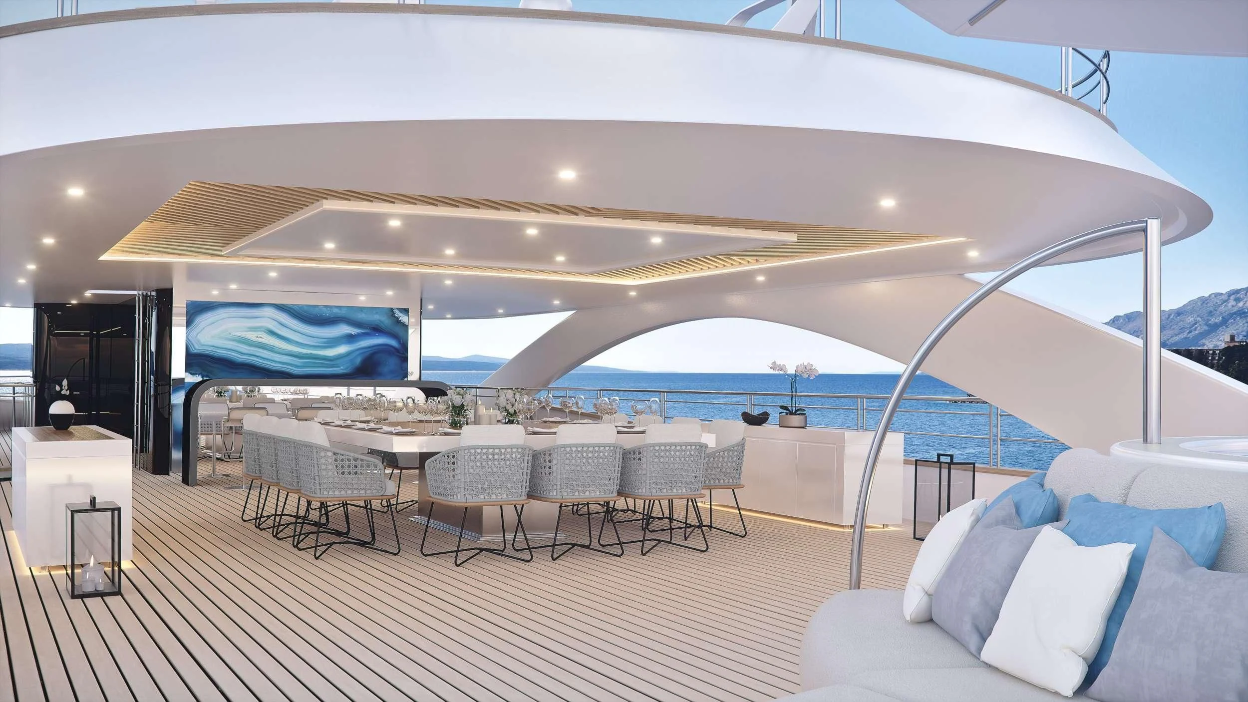 a large white tent with a large deck and a large pool aboard M/Y ANTHEA Yacht for Sale