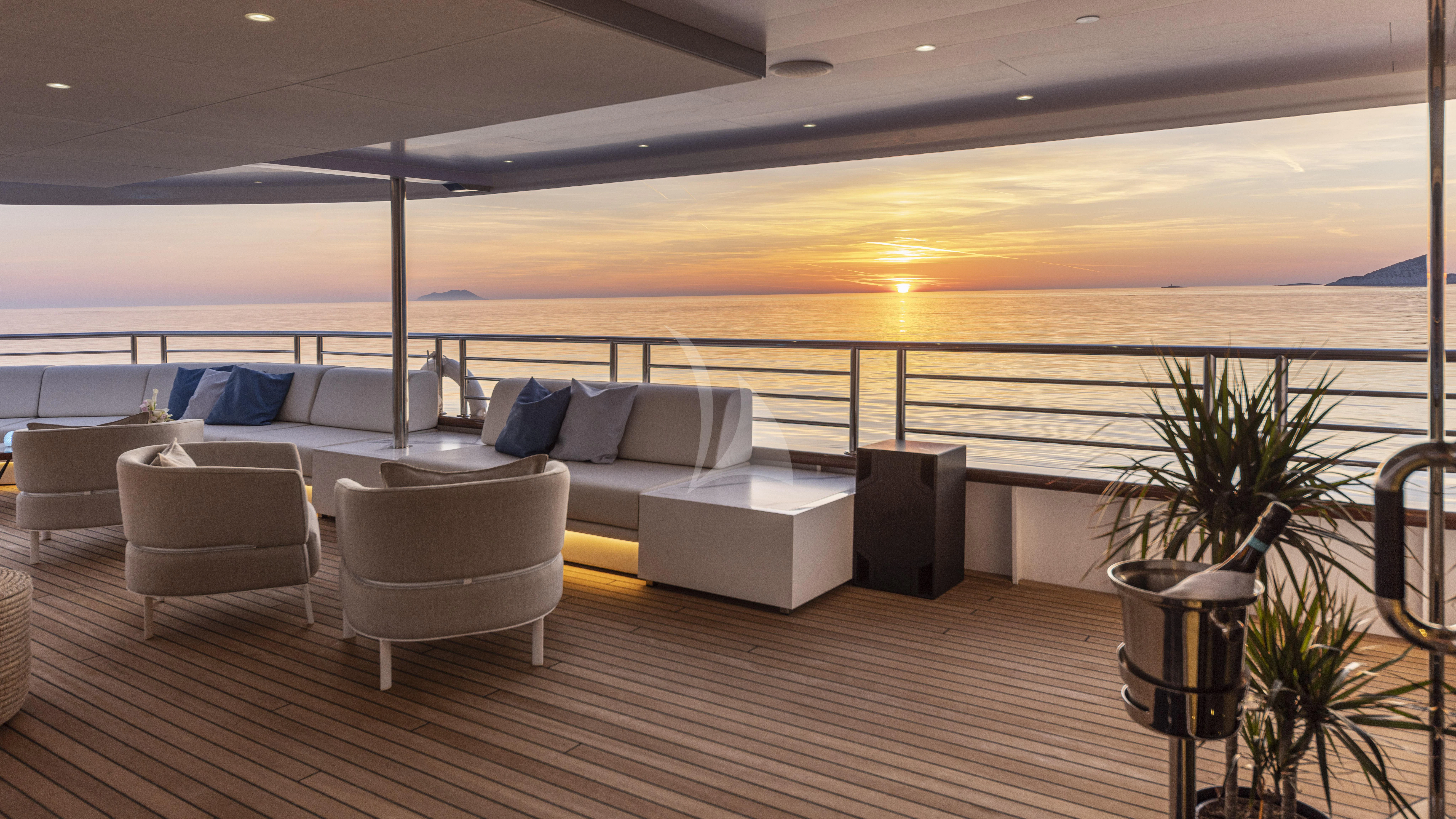 a large living room with a large body of water aboard M/Y ANTHEA Yacht for Sale