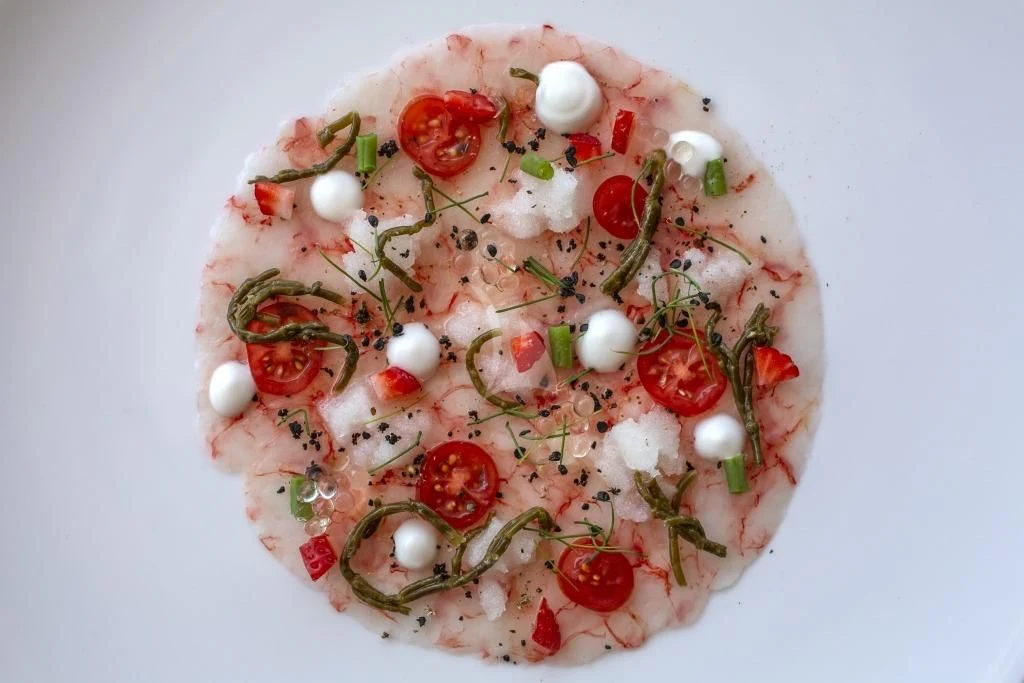 a plate of food aboard M/Y ANTHEA Yacht for Sale