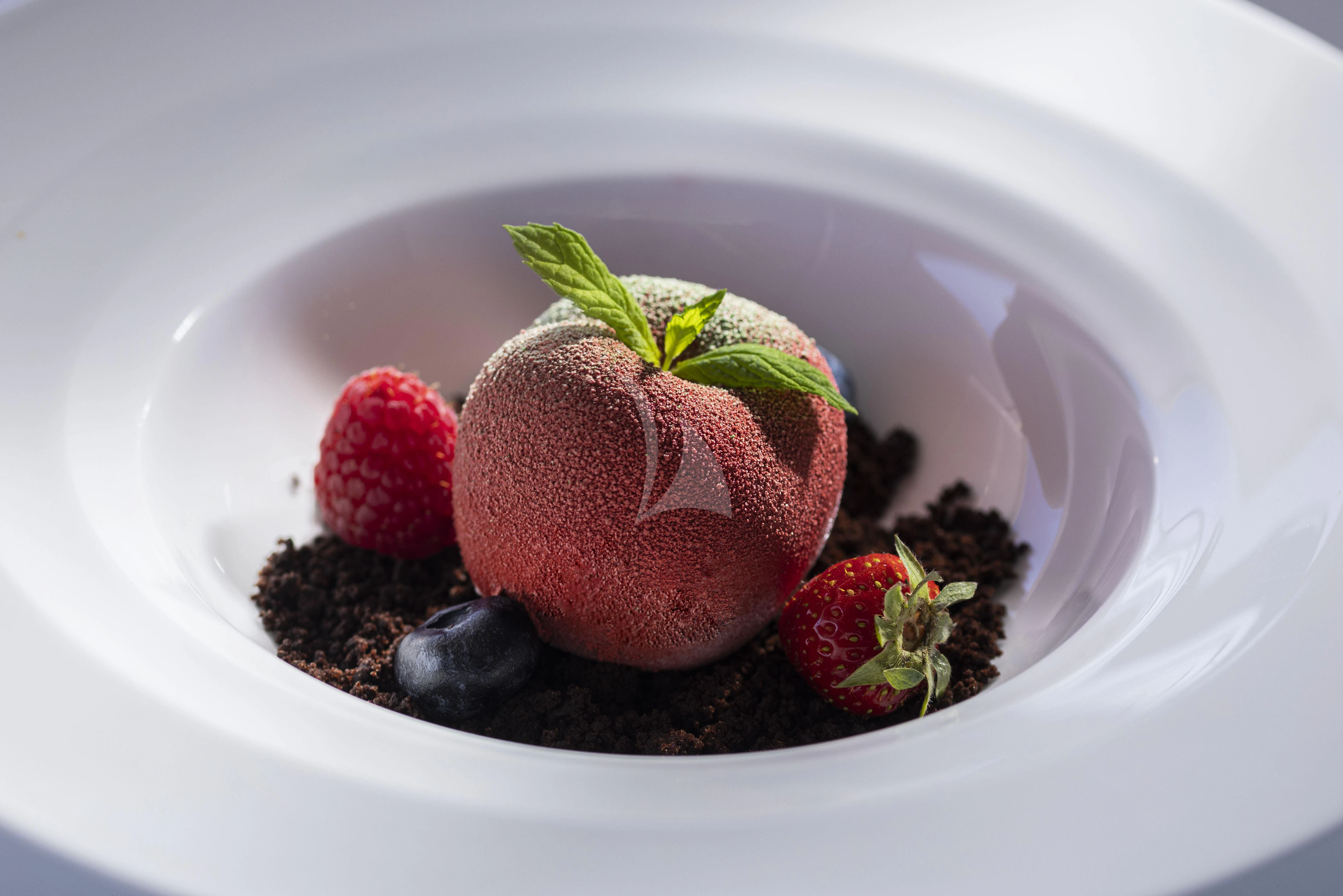 a plate of food aboard M/Y ANTHEA Yacht for Sale