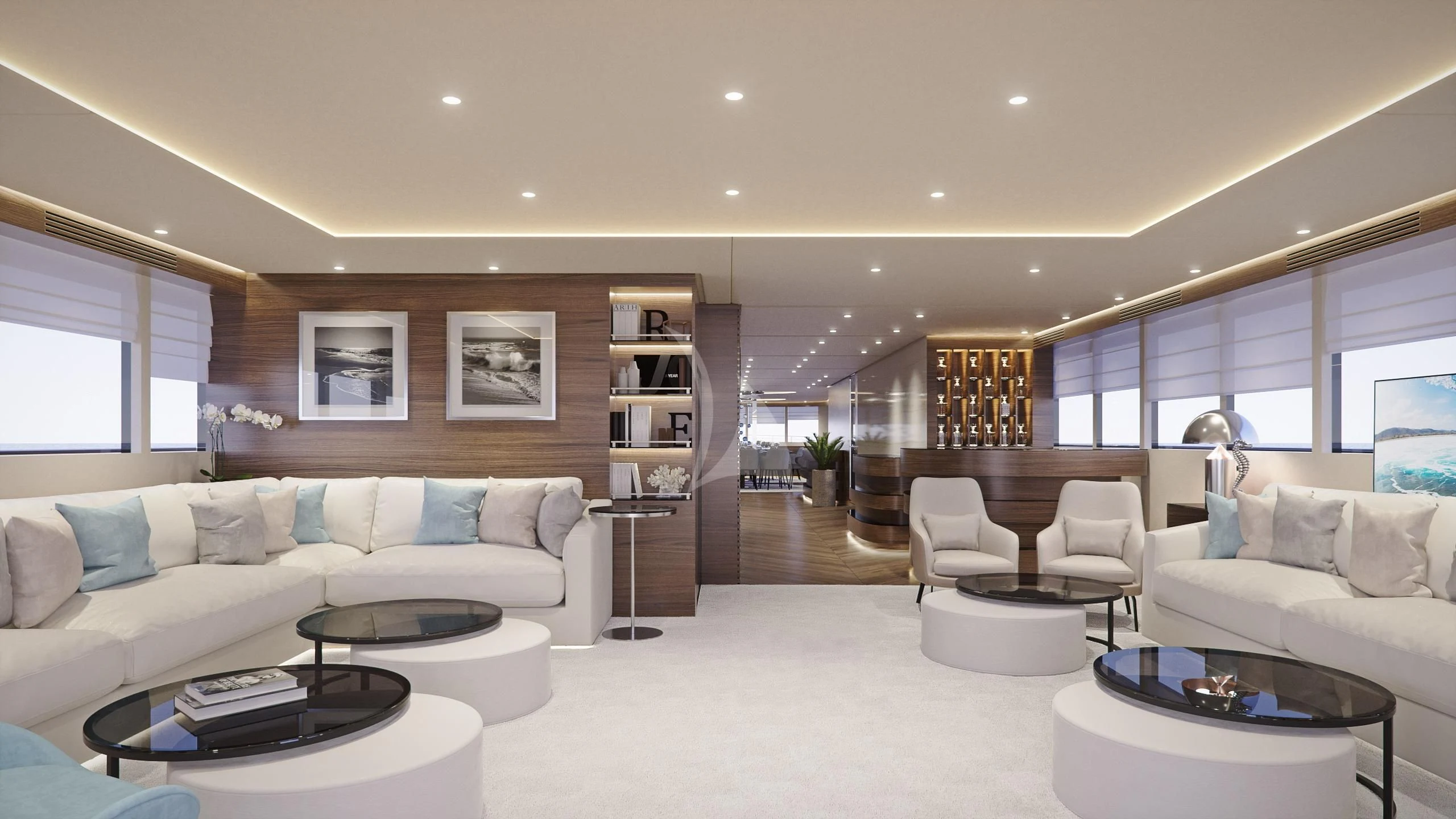 a living room with a couch and a coffee table aboard M/Y ANTHEA Yacht for Sale
