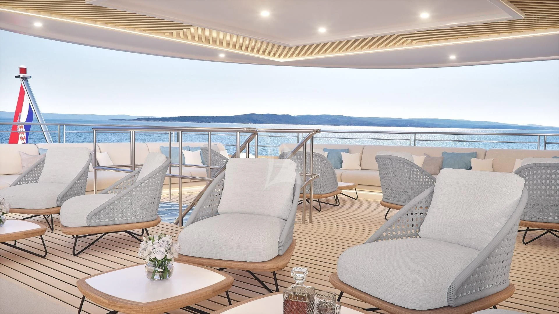 a room with chairs and tables aboard M/Y ANTHEA Yacht for Sale