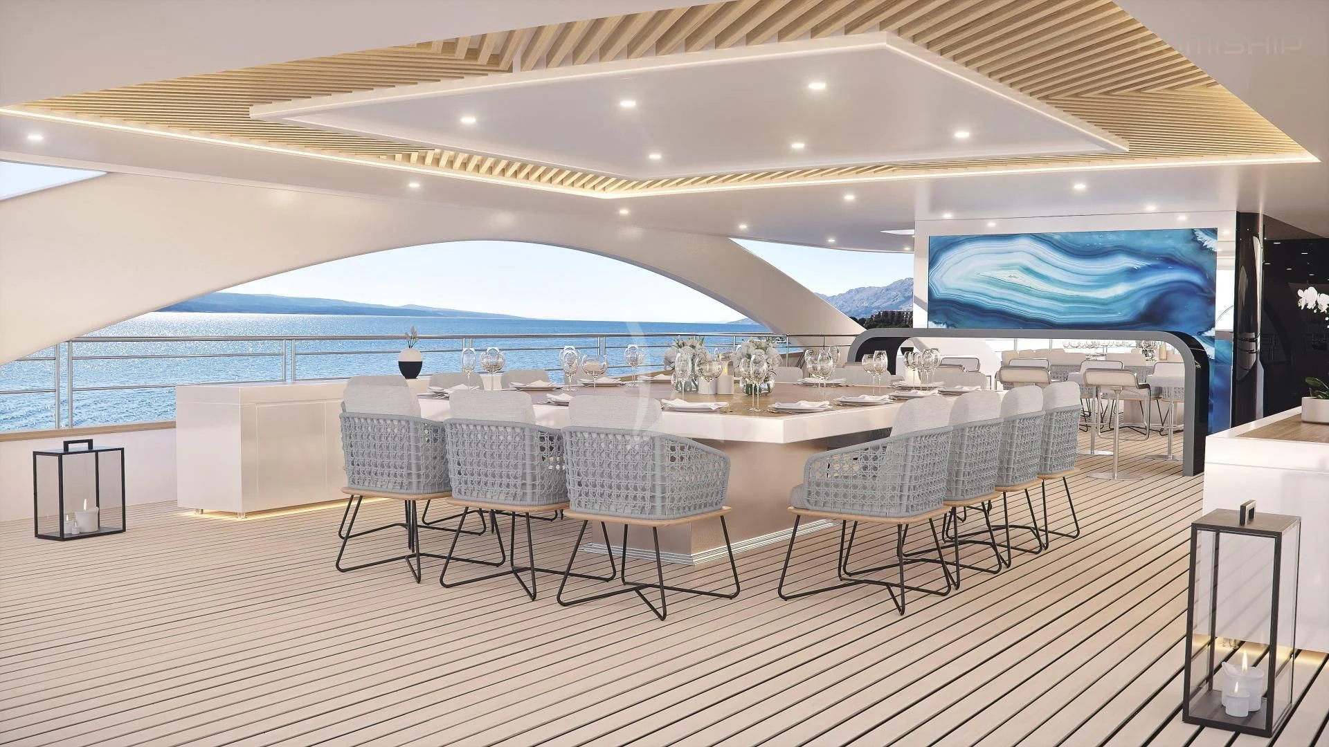 a large room with tables and chairs aboard M/Y ANTHEA Yacht for Sale