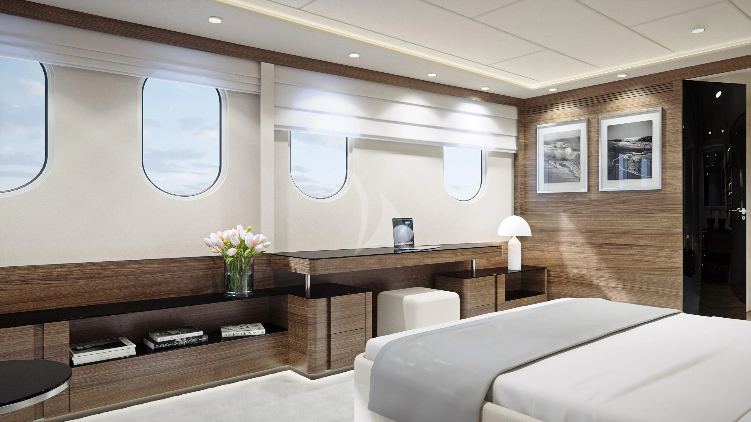 a room with a bed and a desk aboard M/Y ANTHEA Yacht for Sale