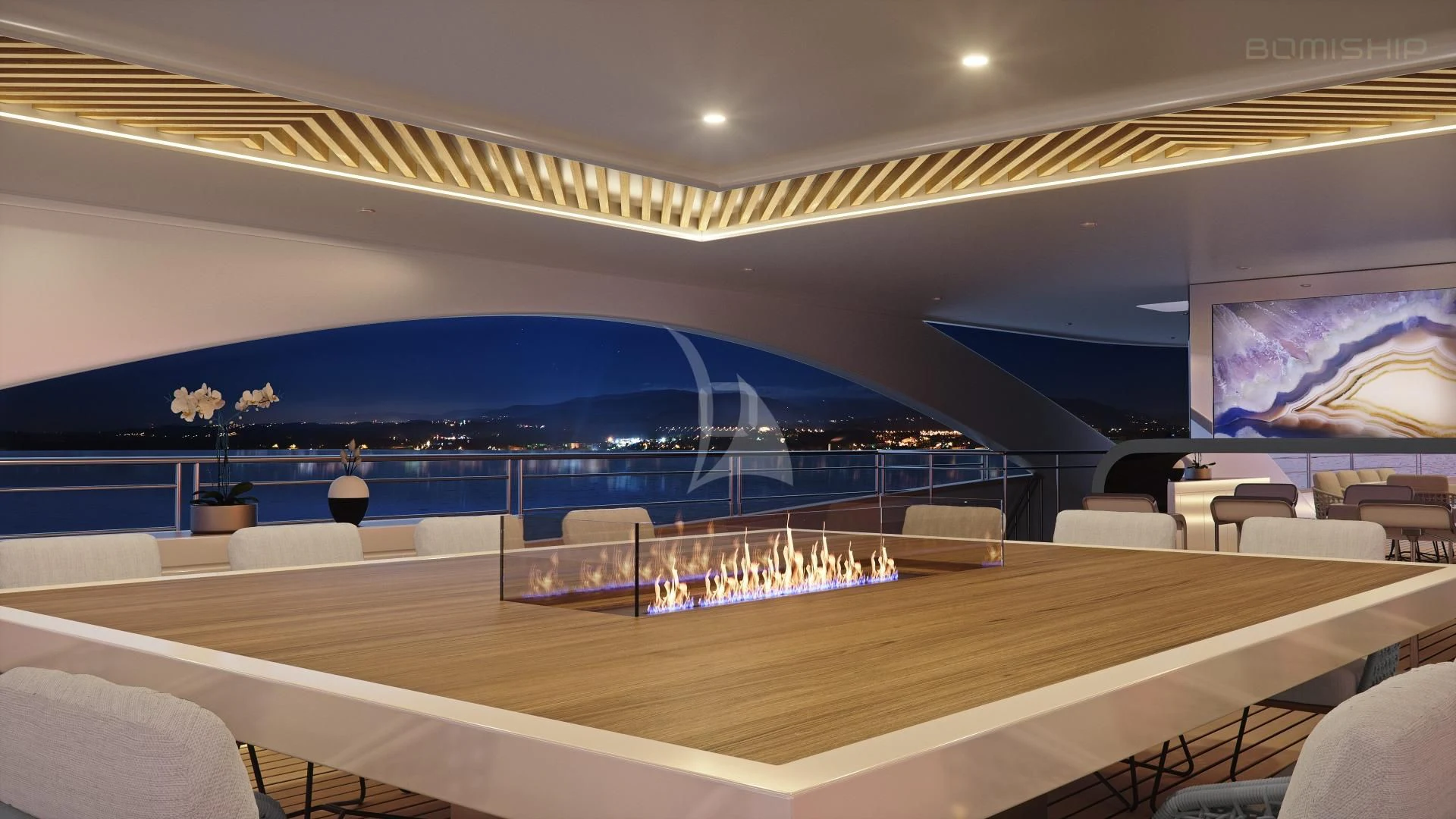 a room with a large stage and a large blue lit up stage aboard M/Y ANTHEA Yacht for Sale