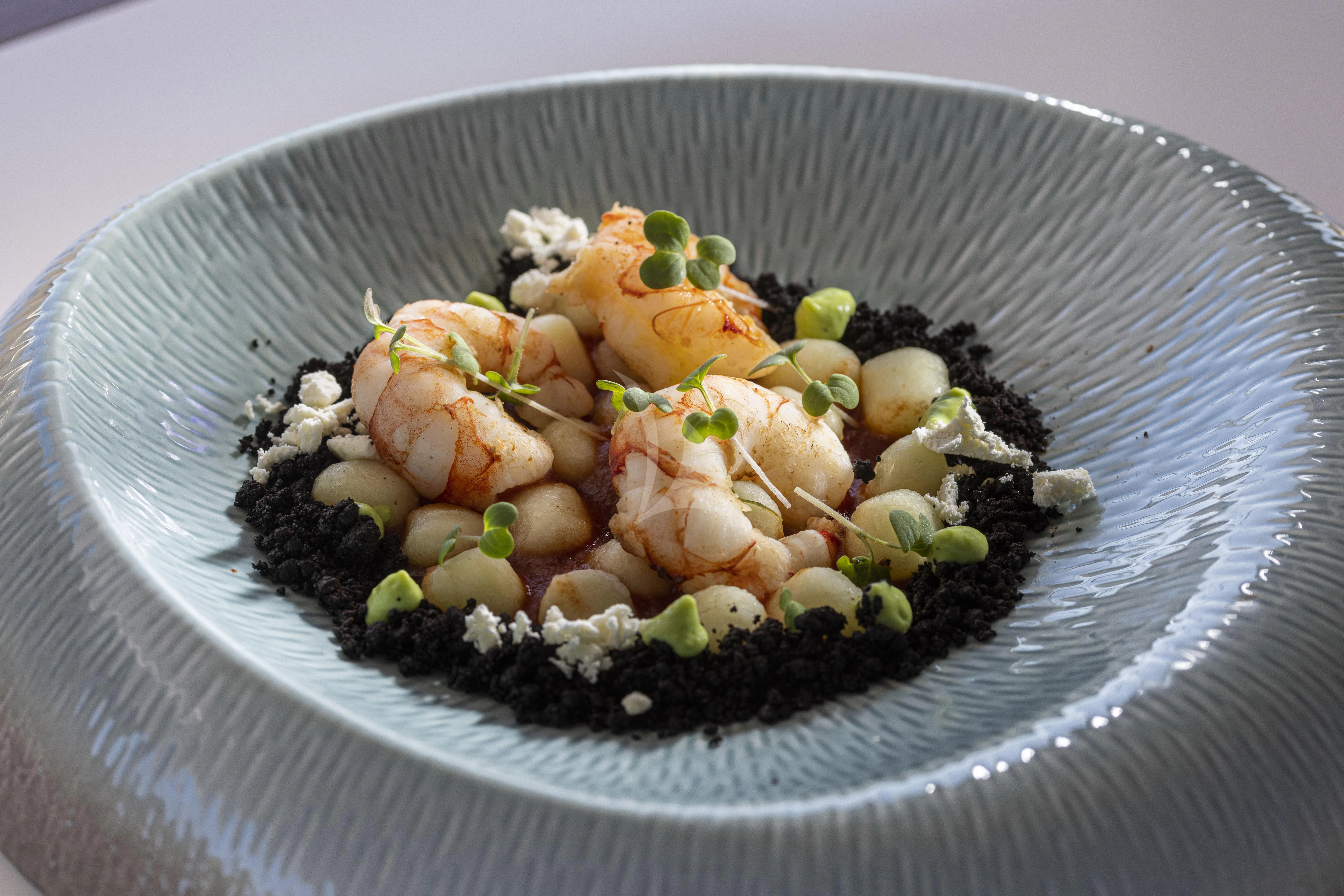 a plate of food aboard M/Y ANTHEA Yacht for Sale