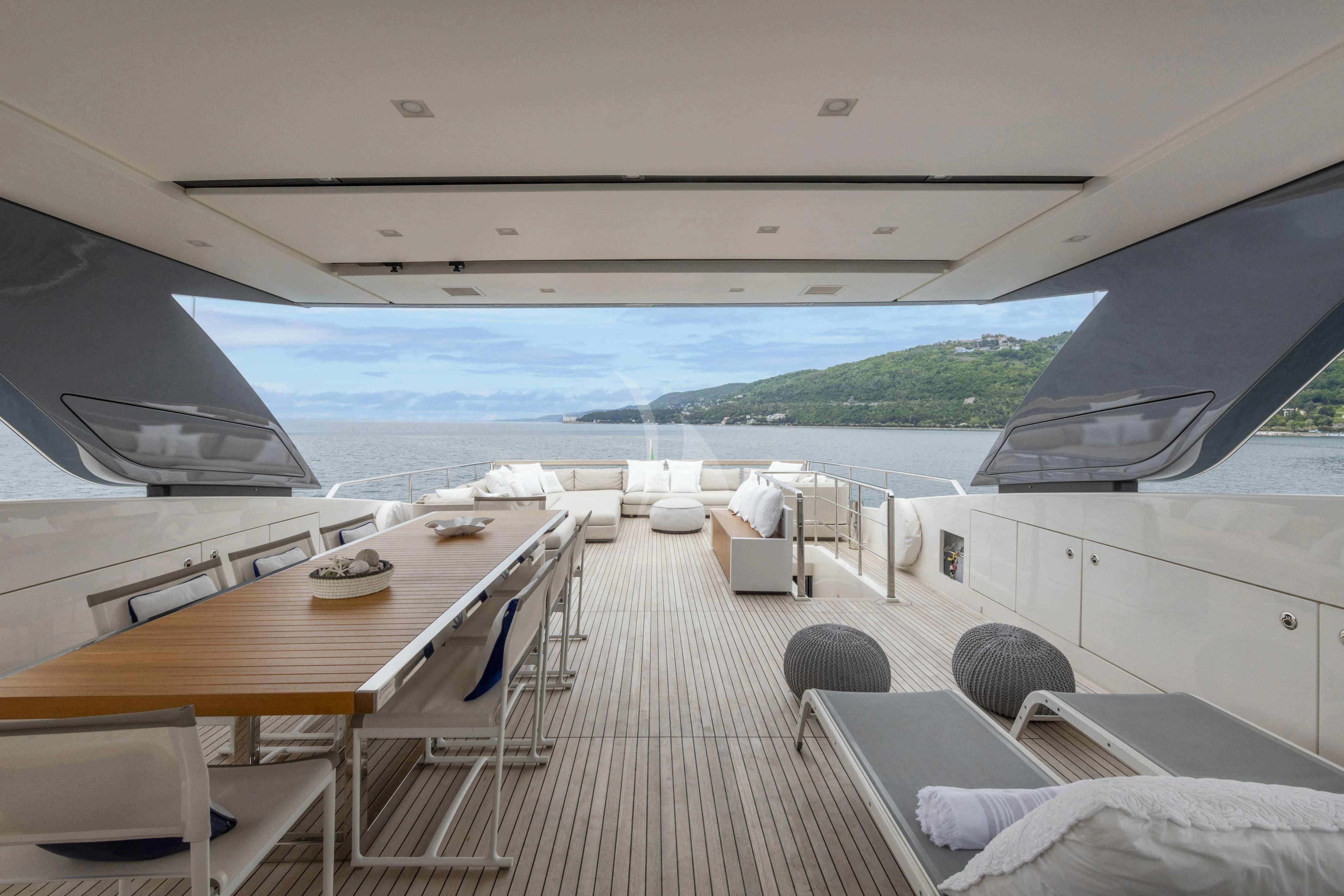 a large room with a view of the ocean and the land aboard VITTORIA Yacht for Charter