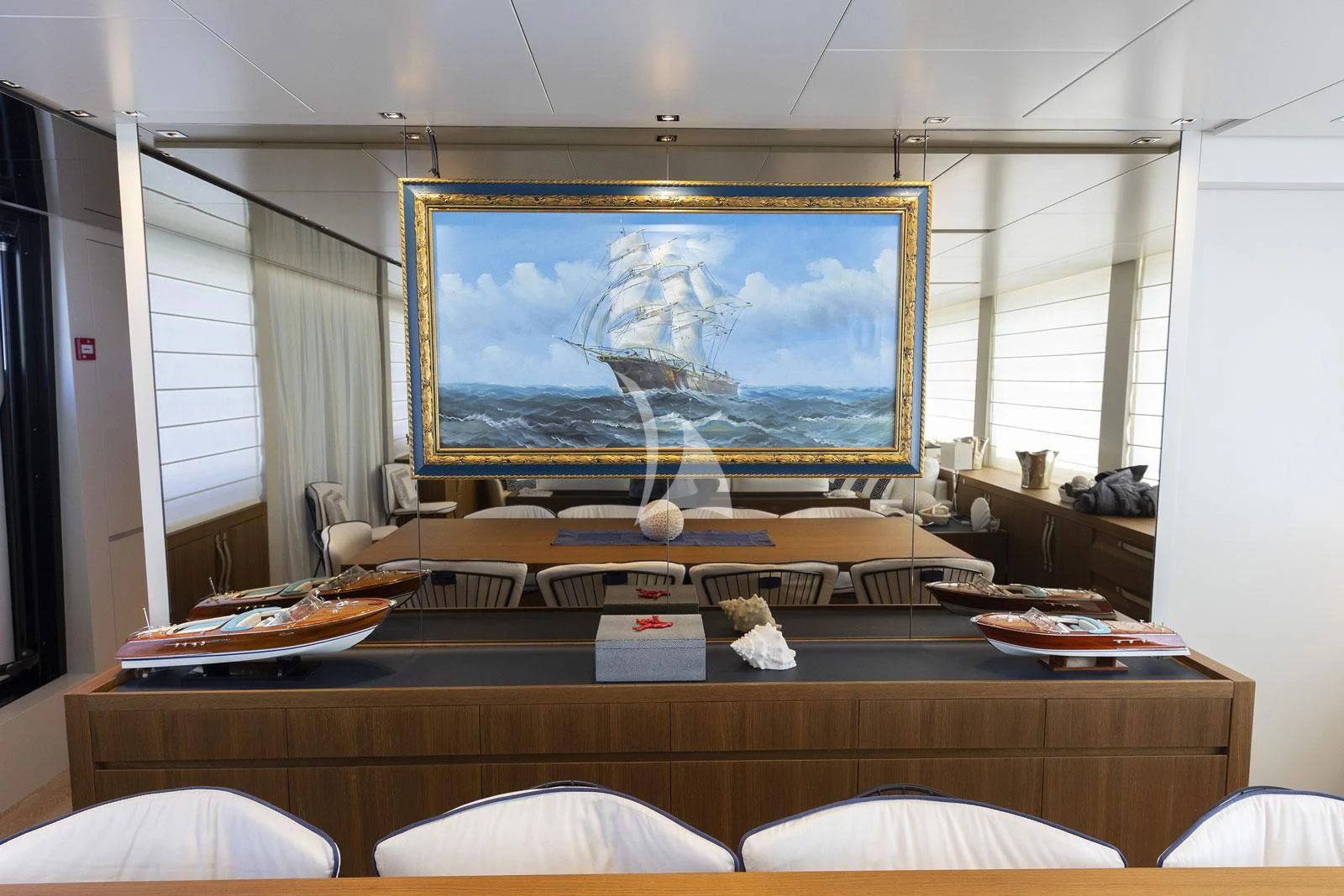 a large screen on a wall aboard VITTORIA Yacht for Charter