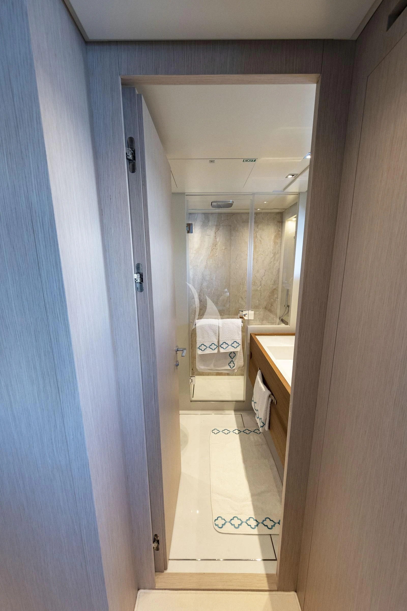 a bathroom with a sink and a mirror aboard VITTORIA Yacht for Charter