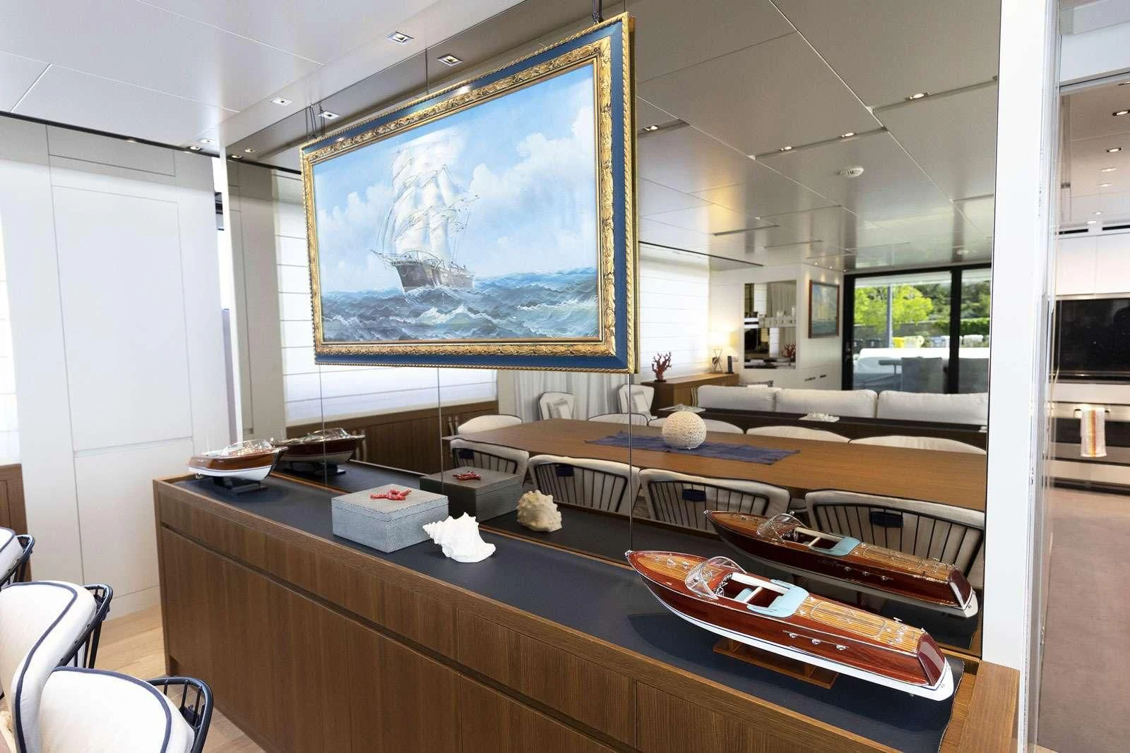 a room with a large painting aboard VITTORIA Yacht for Charter