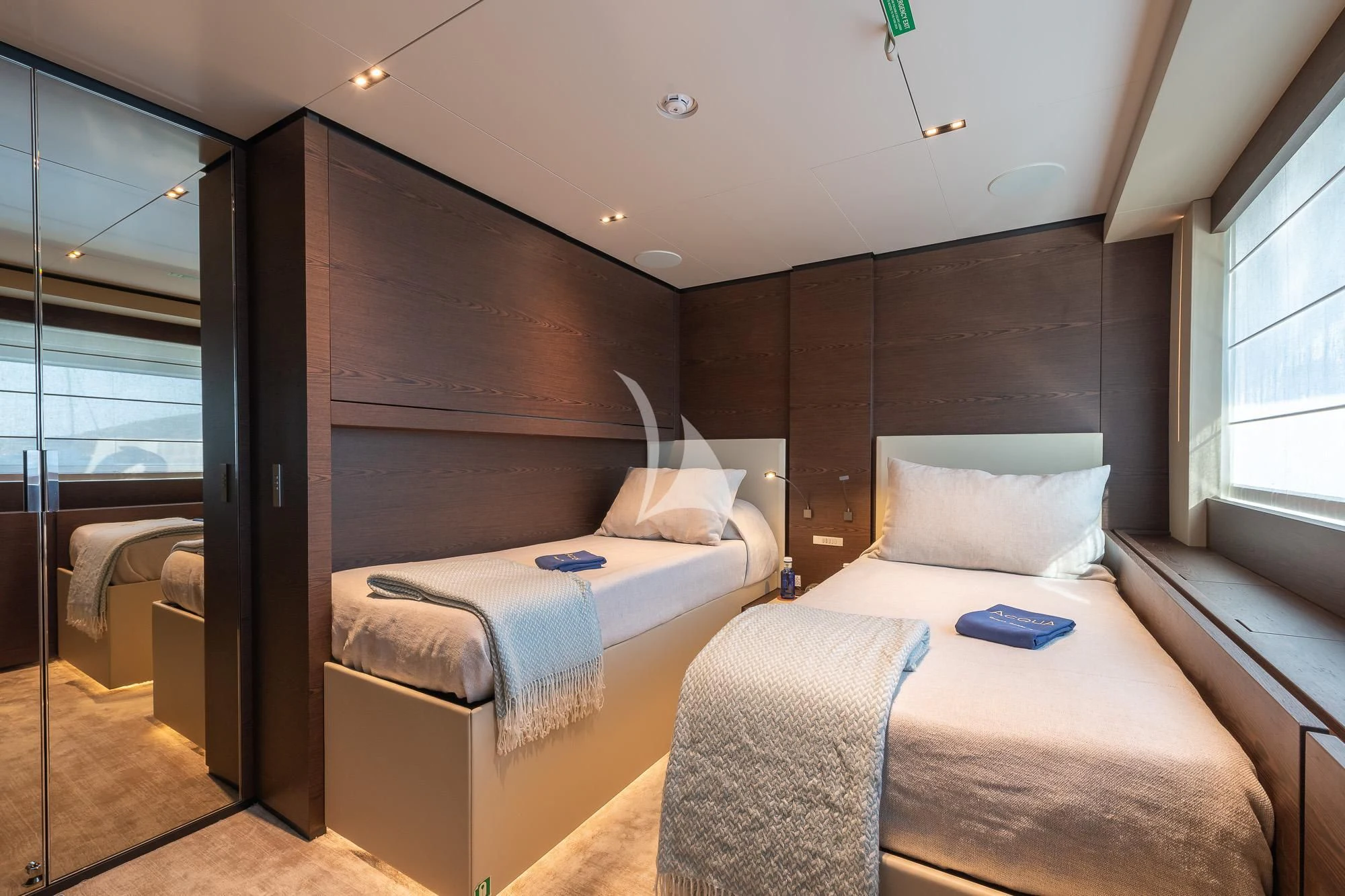 a room with two beds aboard ACQUA Yacht for Sale